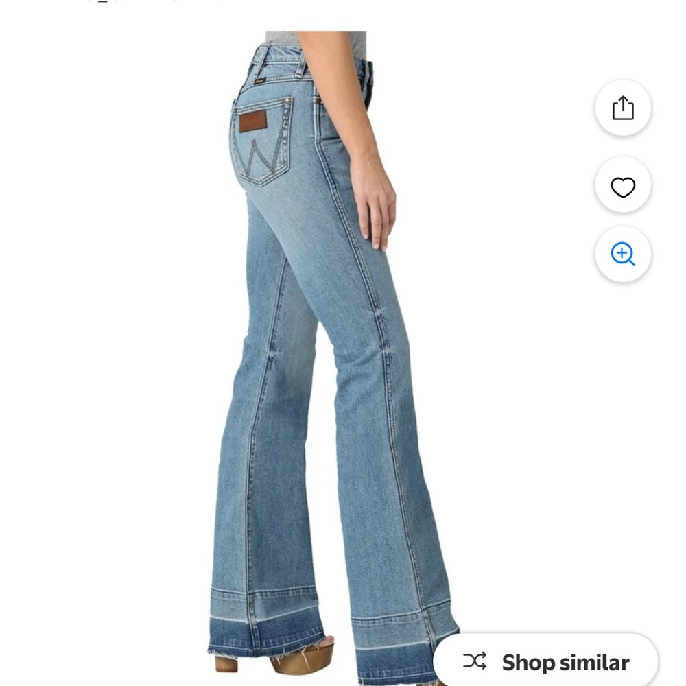 Wrangler Light Blue Flare Jeans with Raw Hem Detail